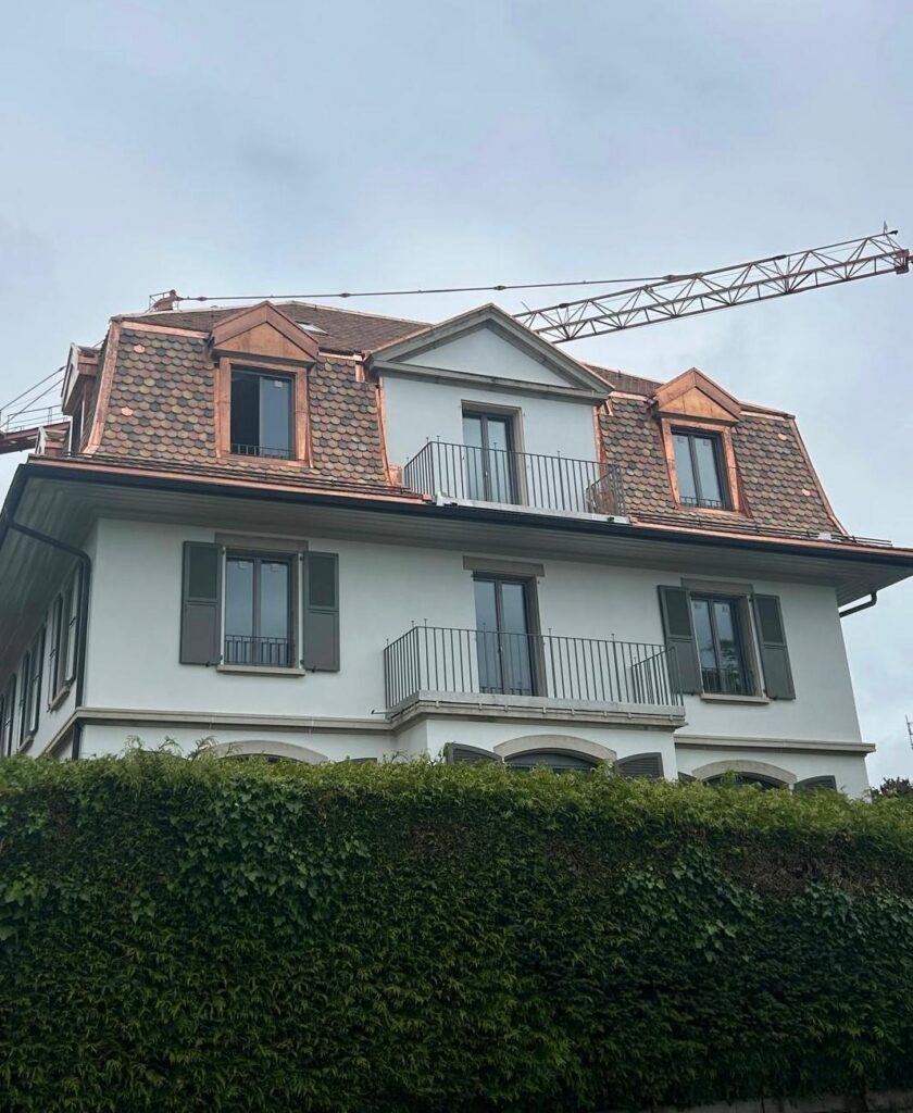 Charpente et lucarnes d'une maison de maître — Lausanne